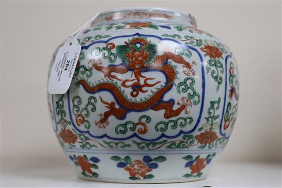 A Chinese wucai dragon jar, Qing dynasty, H. 16.5cm, repair to rim